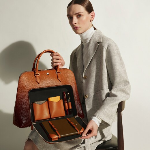 书写旅行家手提包 